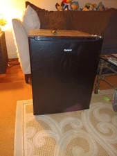Black Galanz Mini Fridge with small freezer compartment