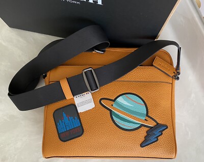 NWT COACH CHARLES TANGERINE LEATHER CAMERA BAG WITH NY SPACE