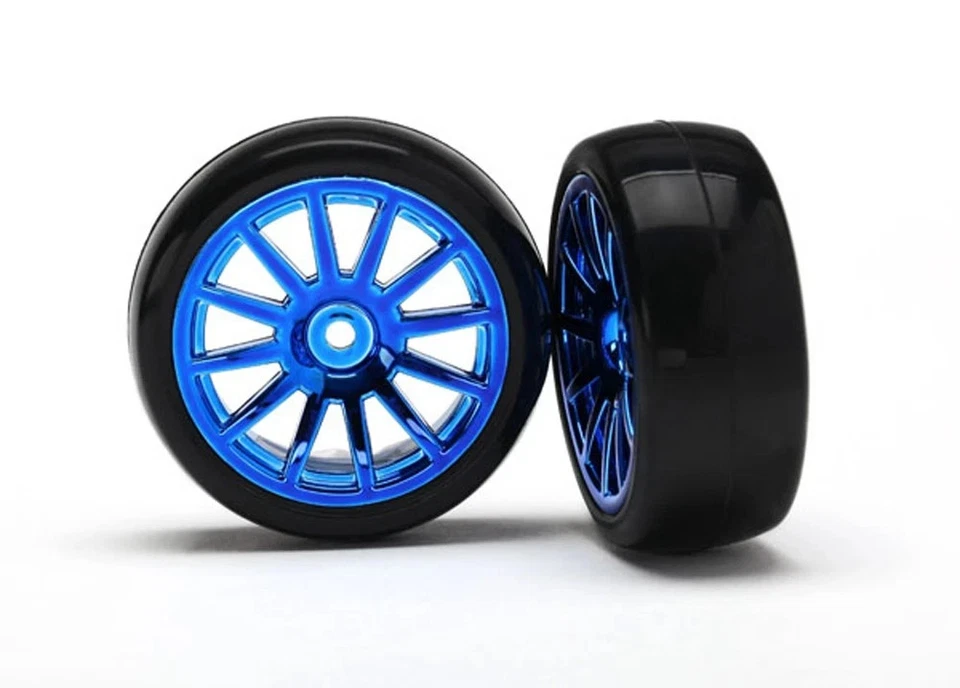 LATRAX 7573R - 1/18 SLICK TIRES - 12 SPOKE WHEELS-2PK-BLUE CHROME-TRAXXAS 7573R - Image 1 of 1