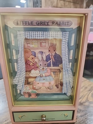 little grey rabbit music box plays '' i taut i taw a puddy tat''