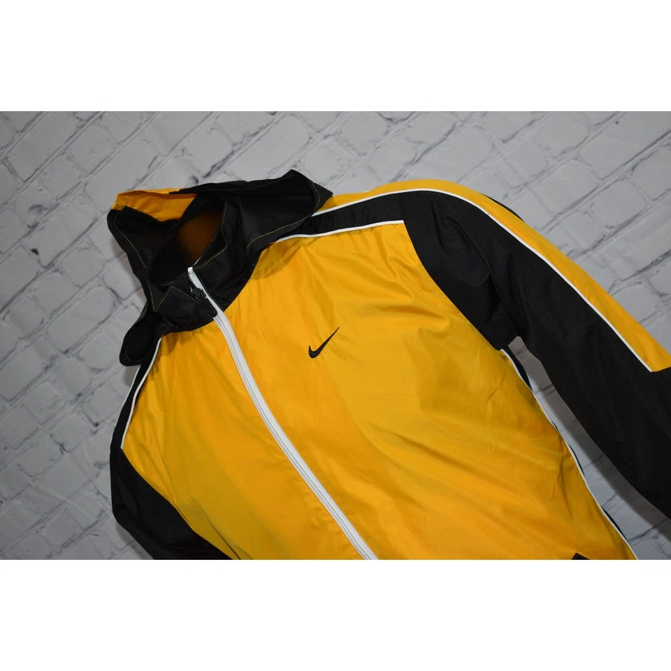Chaqueta deportiva Nike para niños talla XL dorada amarilla negra poliéster cremallera completa Foto 3 de 4