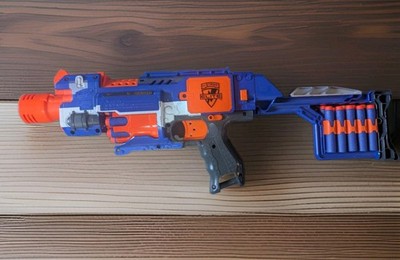 Lot of 4 Diff Nerf N-Strike Elite Blasters fully loaded w/Darts See Pics + Desc.