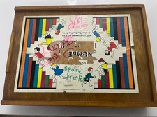 Vintage Cuisenaire numbers in colour wooden counting Rods and box for children.