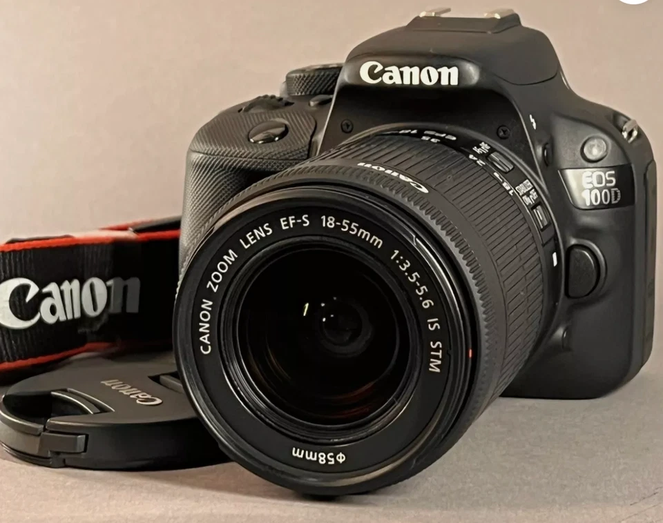 SLR camera Canon EOS 100D Kit with 18 MP + 18-55mm IS STM + 50mm 1.8 and goodies