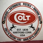 VINTAGE 1961 DATED COLT FIREARMS REVOLVERS PISTOLS GUNS 10” PORCELAIN GAS SIGN