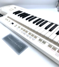 Roland Lucina AX-09 Keyboard Synthesizer Keytar Good Working Musical Insturument