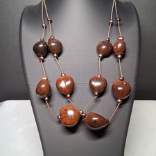 brown tagua nut style necklace featuring oblong shaped necklace 10.5"