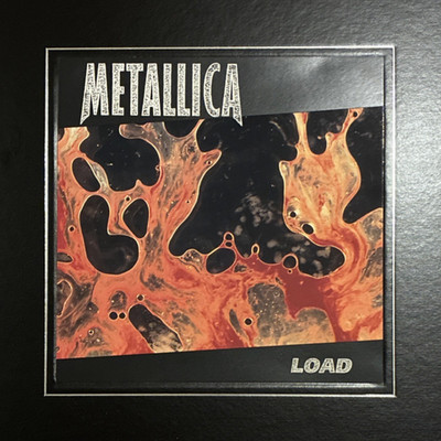 Metallica Load Fanartikel Box mit Aufnäher, Pins, Tourpässe und Sammelkarten