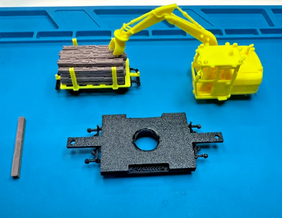 Ho scale Cat Railroad Tie Loader with loaded cart in Yellow unpainted - Image 4 of 4