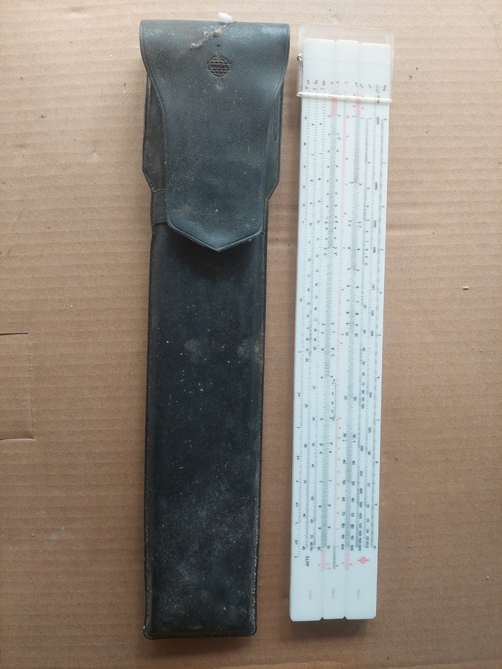 A Polish Skala SLPP logarithmic slide rule with case — a Cold War-era Eastern Bloc scientific instrument that's genuinely rare and geopolitically fascinating as a desk piece.