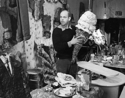 Swedish born American artist Claes Oldenburg holds one of his piec- Old Photo