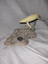 John Perry single Manatee on Burl wood 8x5x4"