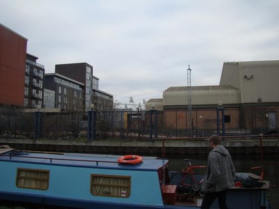 Photo A3 The Olympic Stadium peeking over the top of industrial units on c2012