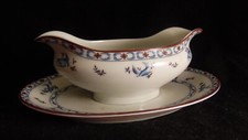 Saucière en porcelaine de Paris / Limoges décor Oiseau Bleu