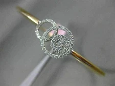 ESTATE .65CT DIAMOND 14KT TWO TONE GOLD CIRCLE OF LIFE FLEXIBLE BANGLE BRACELET