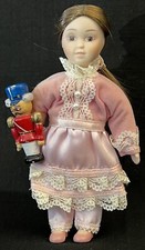 American girl Samantha's porcelain doll, nutcracker w/ Christmas story pamphlet