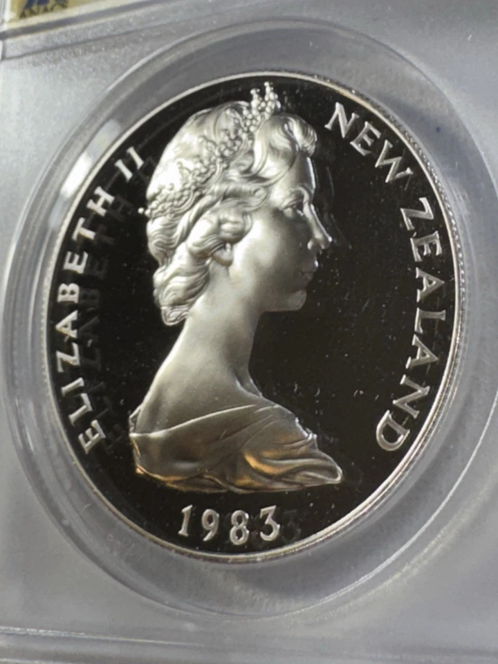 Nueva Zelanda 1983 $1 plata prueba graduada PR 69 DCAM por ANACS 50 años de monedas de Nueva Zelanda Foto 3 de 4