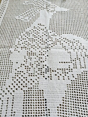 DESIGN - Polo comoda squadrata in maglia lavorata all'uncinetto a