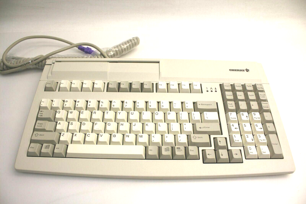 D-91275 CHERRY MINI PS2 7000 KEYBOARD WITH MAG SWIPE READER WHITE