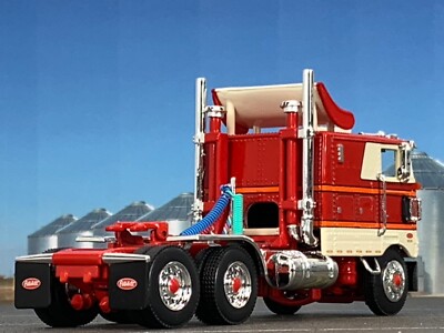 1/64 DCP RED/WHITE/ORANGE 352 PETERBILT COE W/ 110