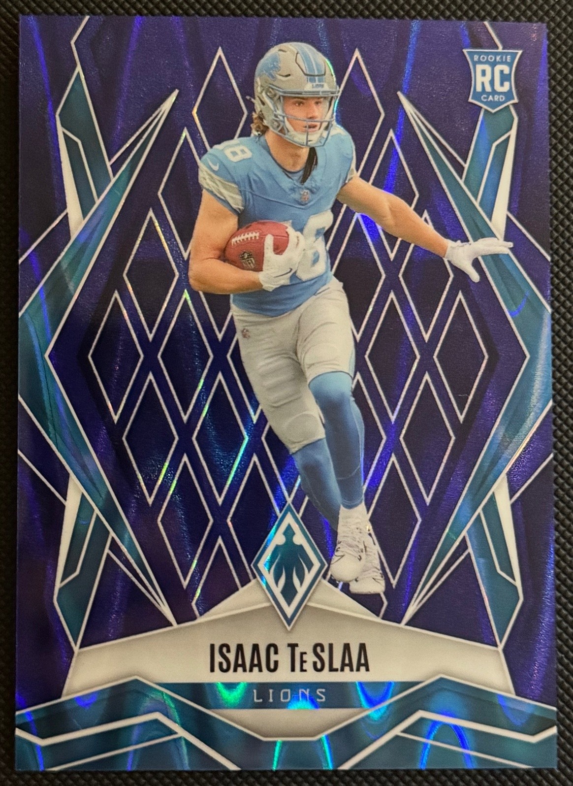 2025 Panini Phoenix Football Isaac TeSlaa Blue Seismic /35 #189 RC Lions