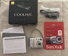 Nikon COOLPIX L11 6.0MP Digital Camera - Matte silver Works Perfectly