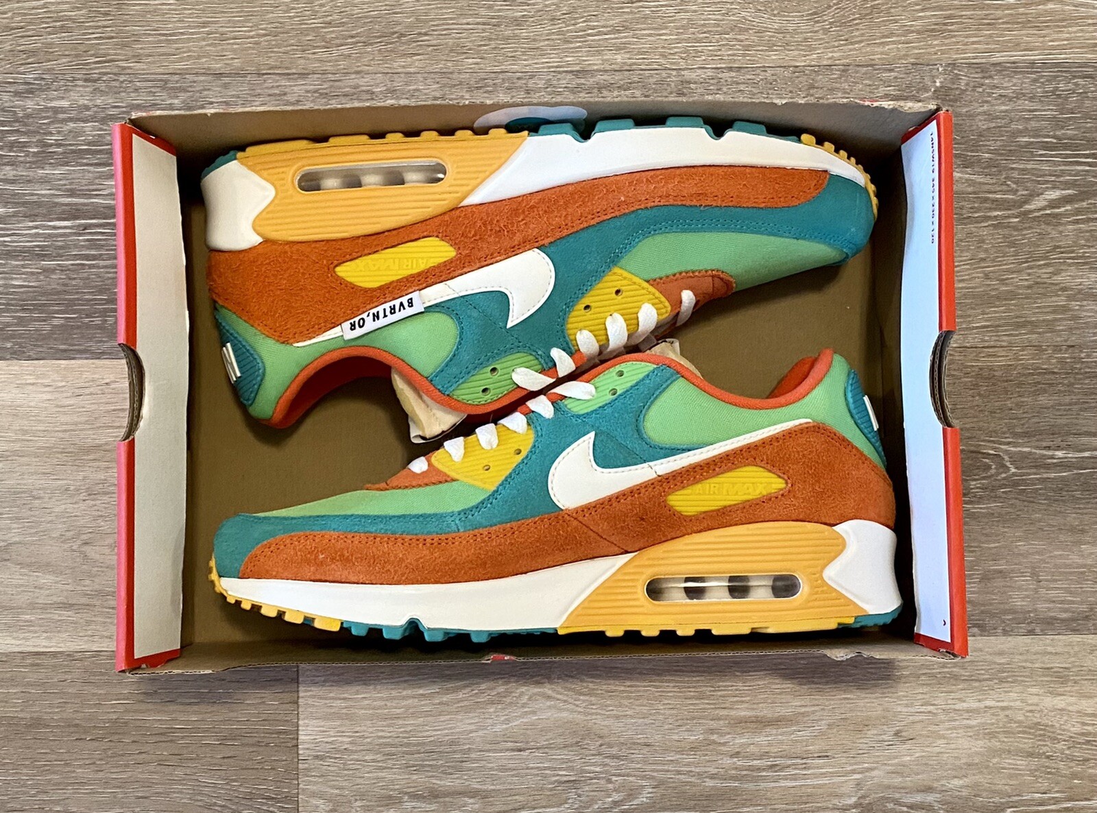 green and orange air max 90