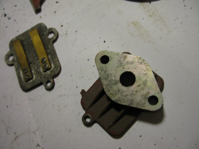 reed valve intake     1950s Johnson JW outboard