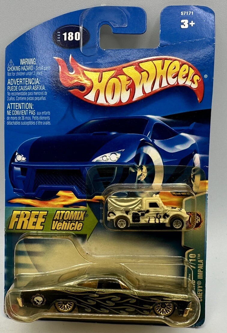 Hot Wheels  Wastelanders 7/10 Chevy Impala 180 Free Atomix Vehicle 2003