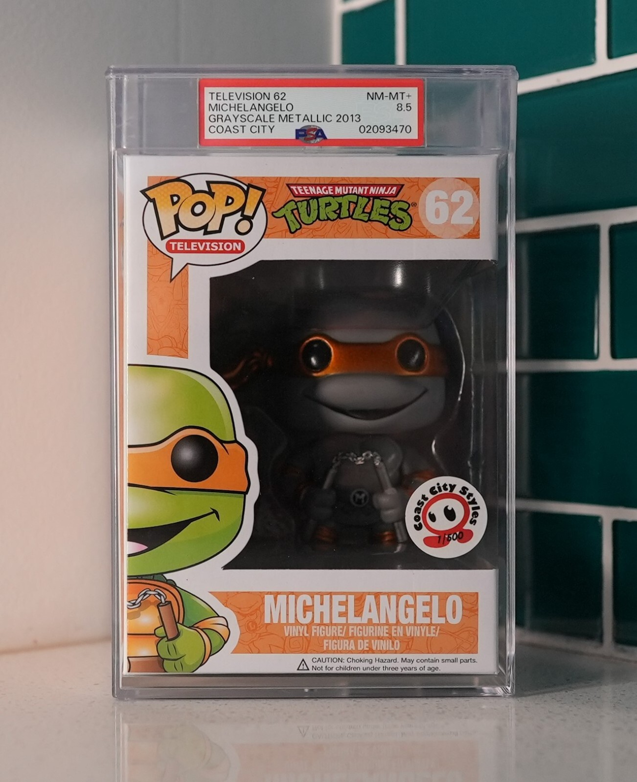 Funko TMNT: Michelangelo 62. Grayscale Metallic. Coast City 500. Graded PSA 8.5