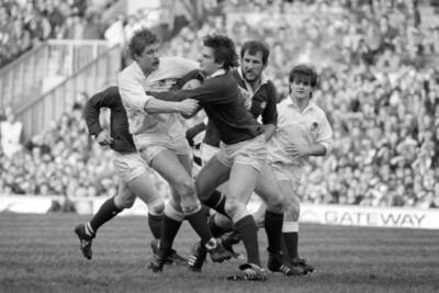 John Beattie of Scotland is tackled by John Scott of England duri - Old Photo