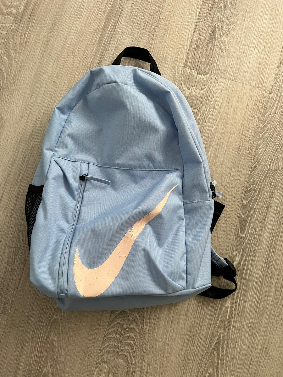 light blue pink Nike backpack