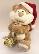 Orso di Natale musicale animato Sound N Light con sax guance soffiate Macy's