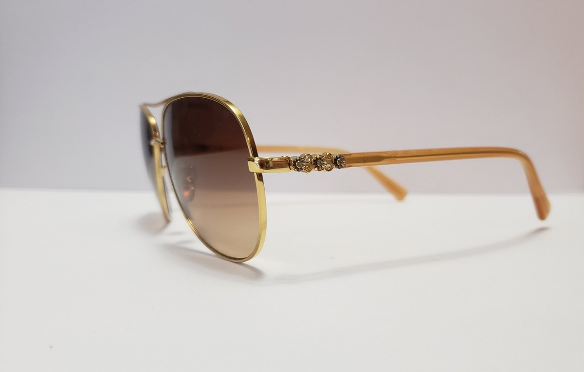 Women\'s Coach Aviator Daisy Rivet Pilot Sunglasses Coach HC7064 L151 sunglasses for women in Light Gold main image 4