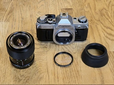 Canon AE-1 SLR Kamera mit 35-70mm 1:3.5-4.8 Objektiv Canon AE 1 Analog Kamera - Bild 1 von 4