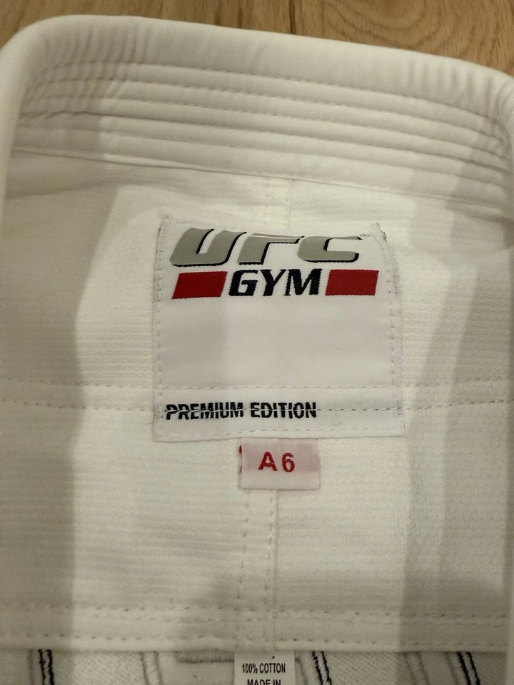 A6 UFC Gimnasio Jiu Jitsu Gi Kimono Bata Blanca Artes Marciales Foto 2 de 4