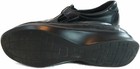 Black leather SAS Roamer women’s shoe with closed lacing, textured sole, and visible SAS logo on heel.