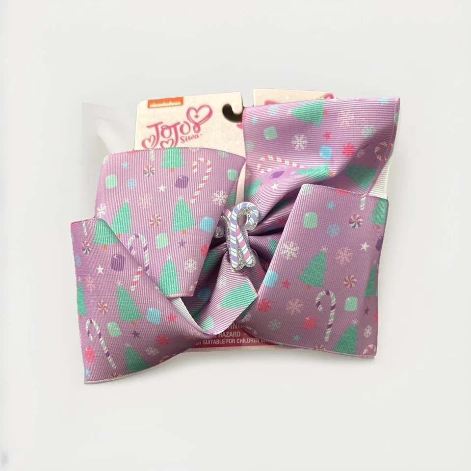 Arco de Navidad púrpura Nickelodeon Jojo Siwa bastones de caramelo árbol Jojo arco Foto 2 de 4