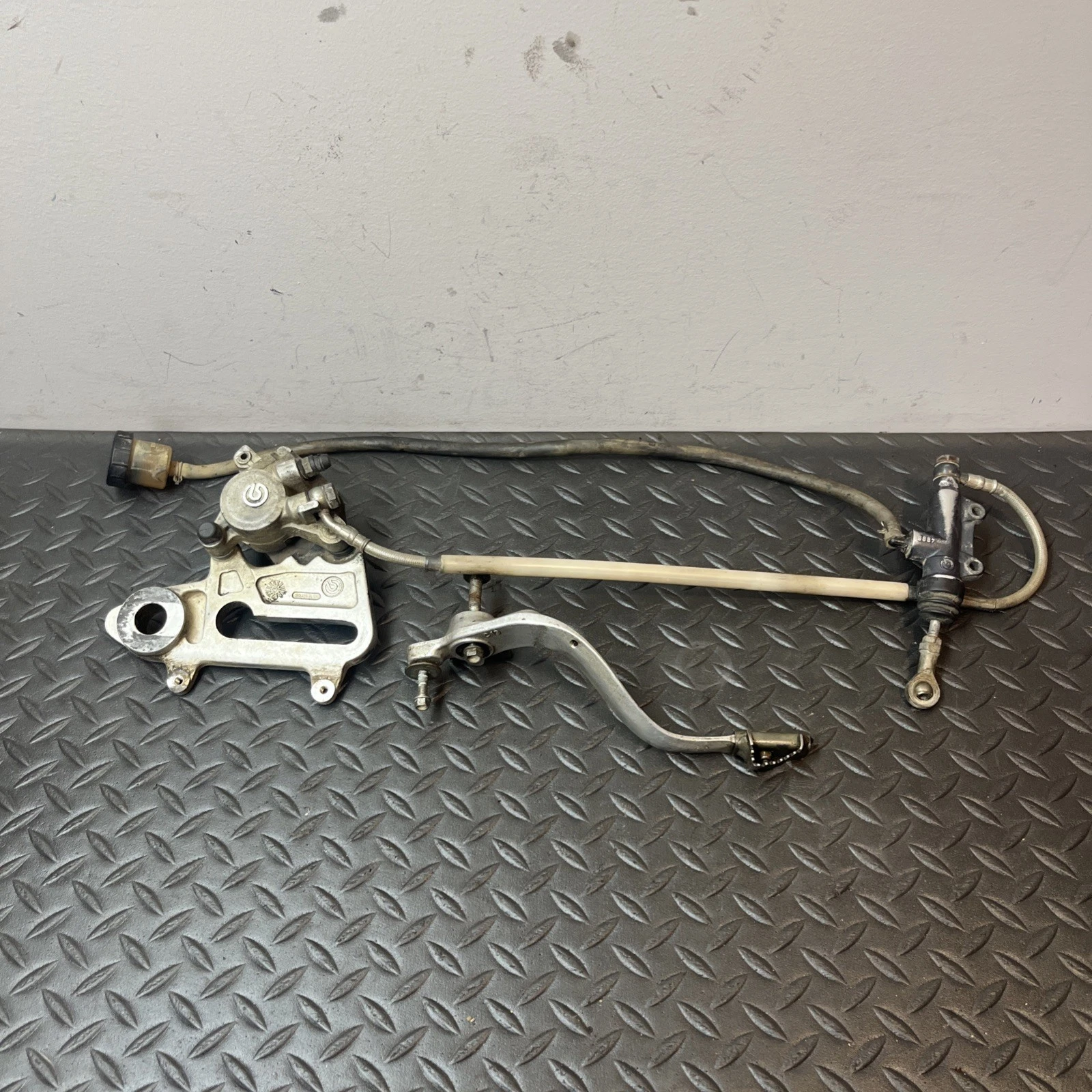 1996 KTM 250 MXC OEM Rear Brake Caliper Master Cylinder Line Pedal