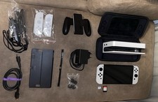 Nintendo Switch OLED Weiß 64GB + 1TB Samsung EVO Plus + The Outer Worlds + …