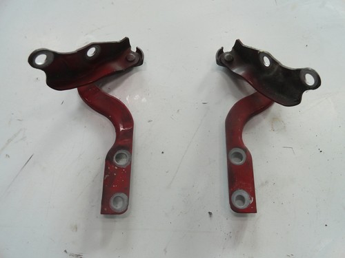 Mazda 121 II 2 DB 1,3i 16V 53KW 90-96 motorhaubenhalter rot 2x R+L