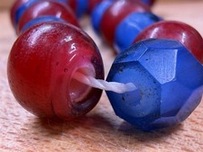 Bohemian faceted &ldquo;Russian blue&rdquo; and Venetian red whiteheart beads/African trade