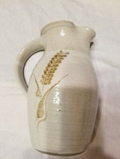 pitcher clay with wheat handle 9 in tall 5 in widest mouth