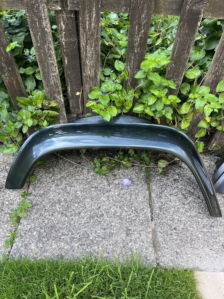 LAND ROVER DEFENDER GENUINE REAR 2 Front WHEEL ARCH TRIM SPAT FENDER