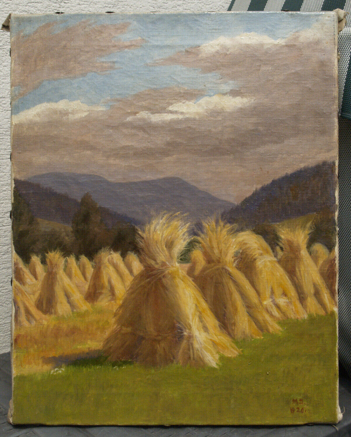 Landschaft mit Heubündel. Signiert. MS 1920. Größe: ca.: 41x51 cm.