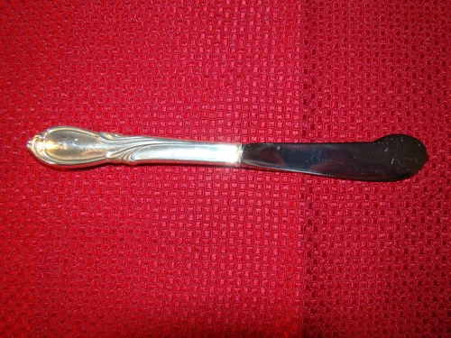 INTERNATIONAL STERLING SILVER RHAPSODY HOLLOW HANDLE BUTTER SPREADER NO MONOGRAM