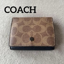   COACH Signature Canvas Trifold Wallet  