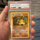 1999 POKEMON BASE SET UNLIMITED #4 CHARIZARD-HOLO PSA 7
