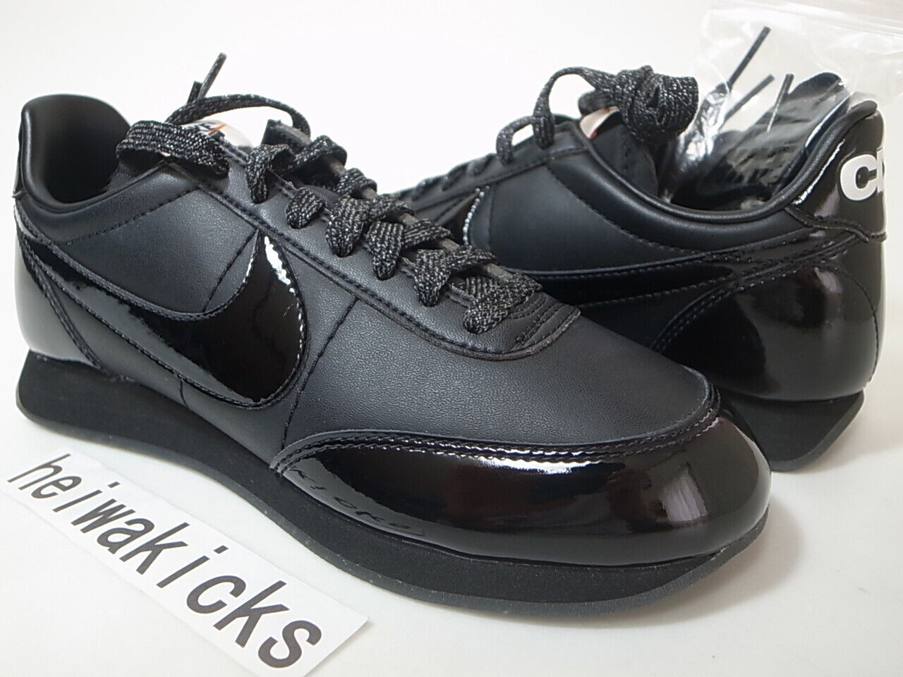 nike night track comme des garcons black