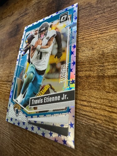 2023 Donruss Optic Travis Etienne Jr. Blue Stars Holo Prizm #86 SP Shortprint - Picture 4 of 8